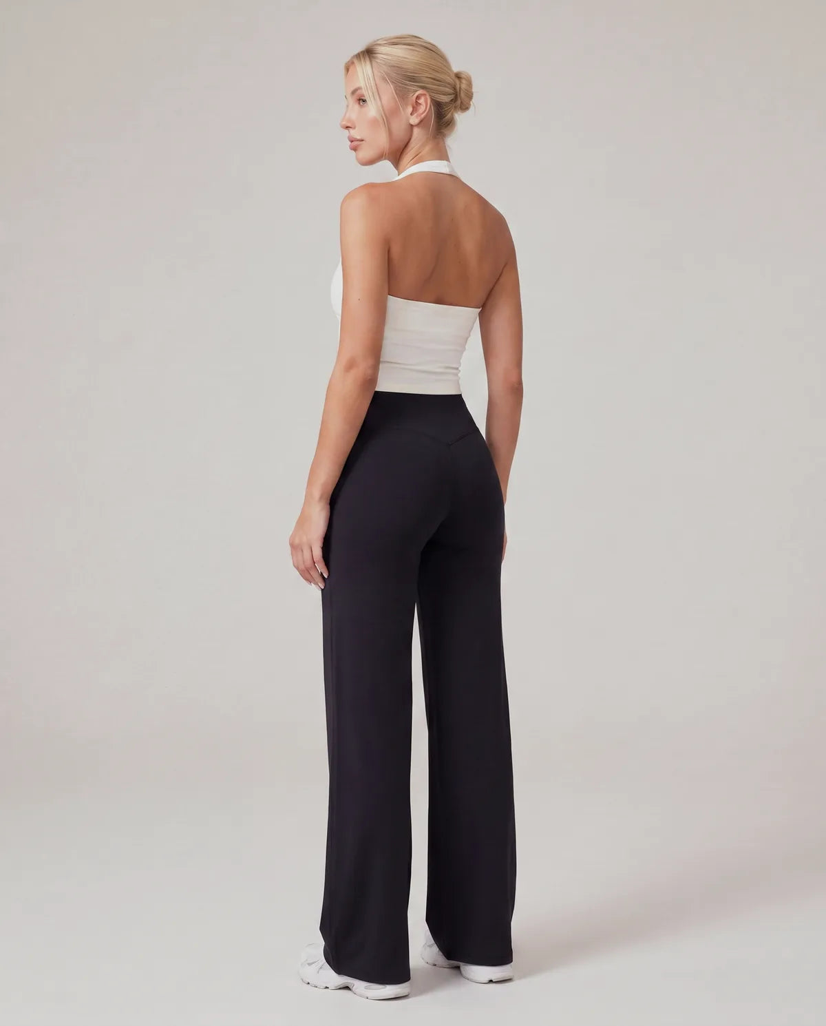 AirSculpt Wide-Leg Leggings in Black, back view with V-back seam
